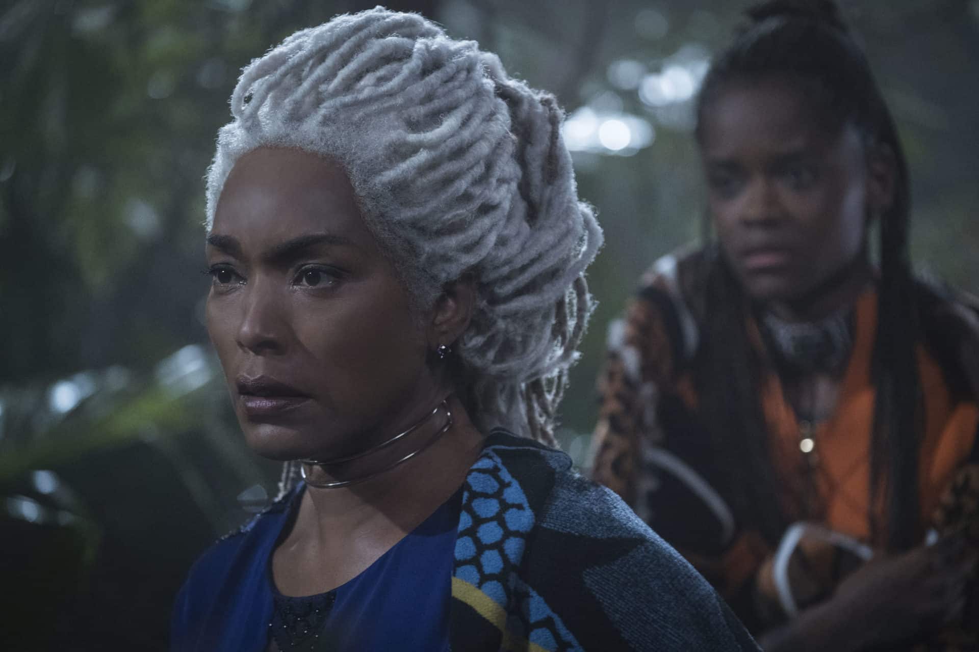 Marvel Studios' BLACK PANTHER..L to R: Ramonda (Angela Bassett) and Shuri (Letitia Wright)..Photo: Matt Kennedy..©Marvel Studios 2018