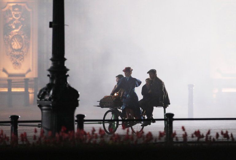 Emily Blunt takes part in filming of a scene from the movie sequel Mary Poppins Returns in front of Buckingham Palace, central London. PRESS ASSOCIATION Photo. Picture date: Saturday April 1, 2017. See PA story SHOWBIZ MaryPoppins. Photo credit should read: Yui Mok/PA Wire