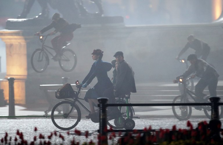 Emily Blunt takes part in filming of a scene from the movie sequel Mary Poppins Returns in front of Buckingham Palace, central London. PRESS ASSOCIATION Photo. Picture date: Saturday April 1, 2017. See PA story SHOWBIZ MaryPoppins. Photo credit should read: Yui Mok/PA Wire