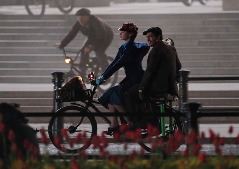 Emily Blunt takes part in filming of a scene from the movie sequel Mary Poppins Returns in front of Buckingham Palace, central London. PRESS ASSOCIATION Photo. Picture date: Saturday April 1, 2017. See PA story SHOWBIZ MaryPoppins. Photo credit should read: Yui Mok/PA Wire