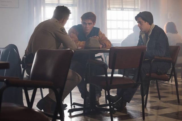 Riverdale -- "A Kiss Before Dying" -- Image Number: RVD201a_0538.jpg -- Pictured (L-R): Martin Cummins as Sheriff Keller, KJ Apa as Archie Andrews, and Cole Sprouse as Jughead Jones -- Photo: Dean Buscher/The CW -- ÃÂ© 2017 The CW Network. All Rights Reserved