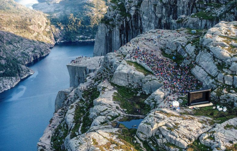 NORWAY OUT
Mandatory Credit: Photo by Carina Johansen/EPA-EFE/REX/Shutterstock (9776598a)
People gathered in the mountain near Preikestolen (The Pulpit Rock) in Forsand near Stavanger, to see the movie "Mission: Impossible - Fallout" in  western Norway, 01 August 2018, Some of the scenes in the movie was filmed at the Norwegian landmark last November.
The Pulpit Rock in Forsand featured in Mission Impossible movie, Norway - 01 Aug 2018