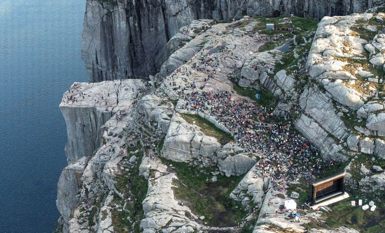 NORWAY OUT
Mandatory Credit: Photo by Carina Johansen/EPA-EFE/REX/Shutterstock (9776598b)
People gathered in the mountain near Preikestolen (The Pulpit Rock) in Forsand near Stavanger, to see the movie "Mission: Impossible - Fallout" in  western Norway, 01 August 2018, Some of the scenes in the movie was filmed at the Norwegian landmark last November.
The Pulpit Rock in Forsand featured in Mission Impossible movie, Norway - 01 Aug 2018