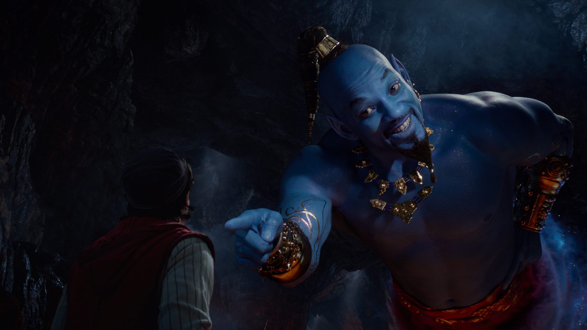 Aladdin (Mena Massoud) meets the larger-than-life blue Genie (Will Smith) in Disneyâ€™s live-action adaptation ALADDIN, directed by Guy Ritchie.