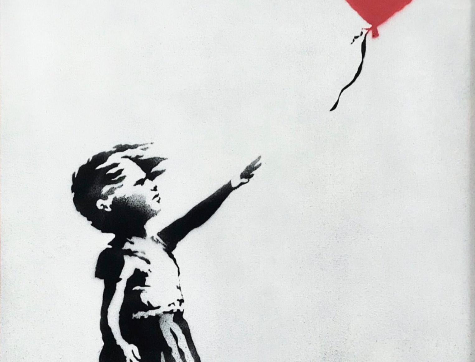 Pintura de Banksy se auto destrói após ser leiloada por £ 1 milhão