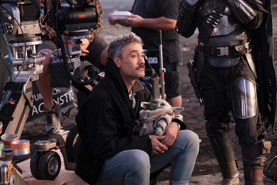 Taika Waititi and the Child on the set of THE MANDALORIAN