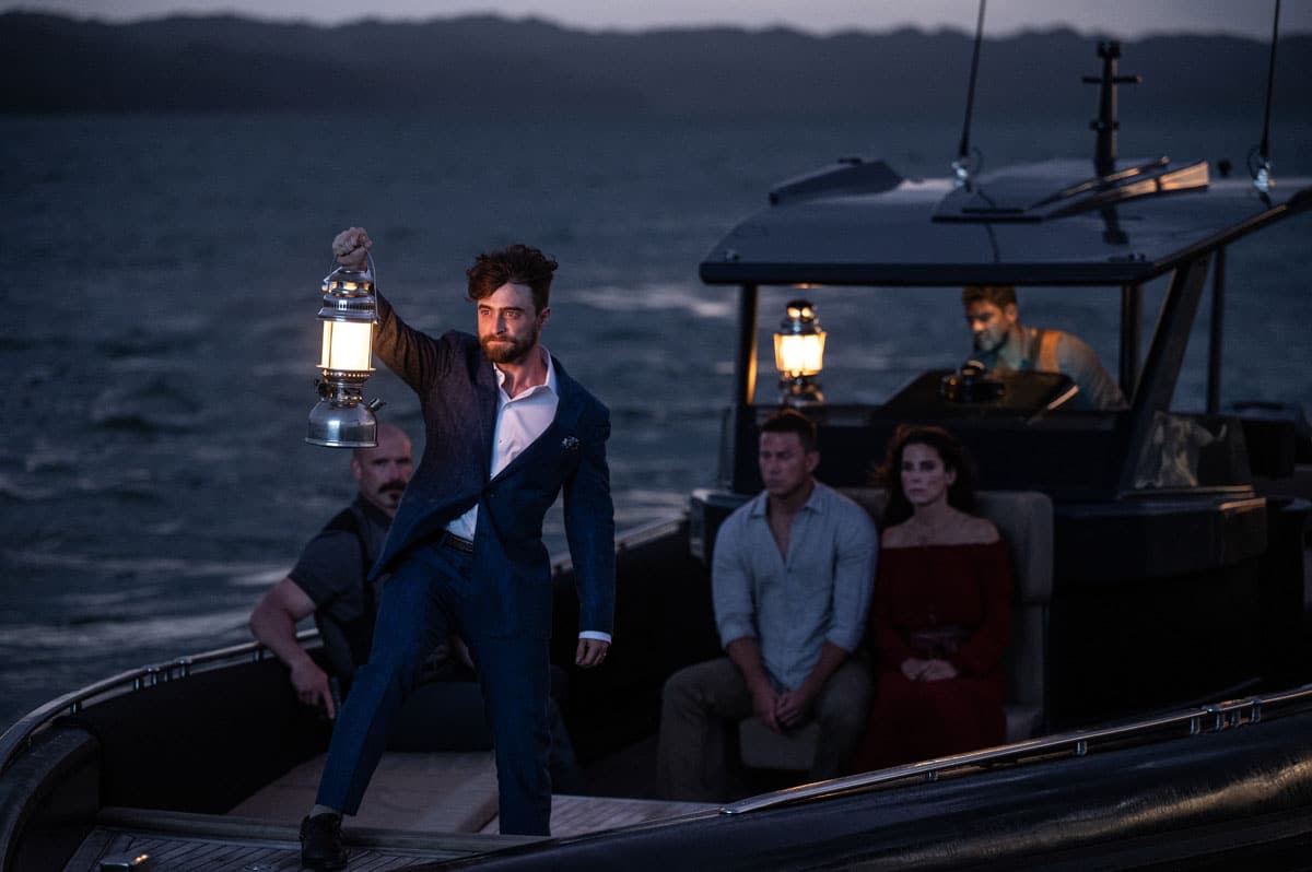 L-r Daniel Radcliff (Standing), Channing Tatum and Sandra Bullock (seated) star in Paramount Pictures' "THE LOST CITY."