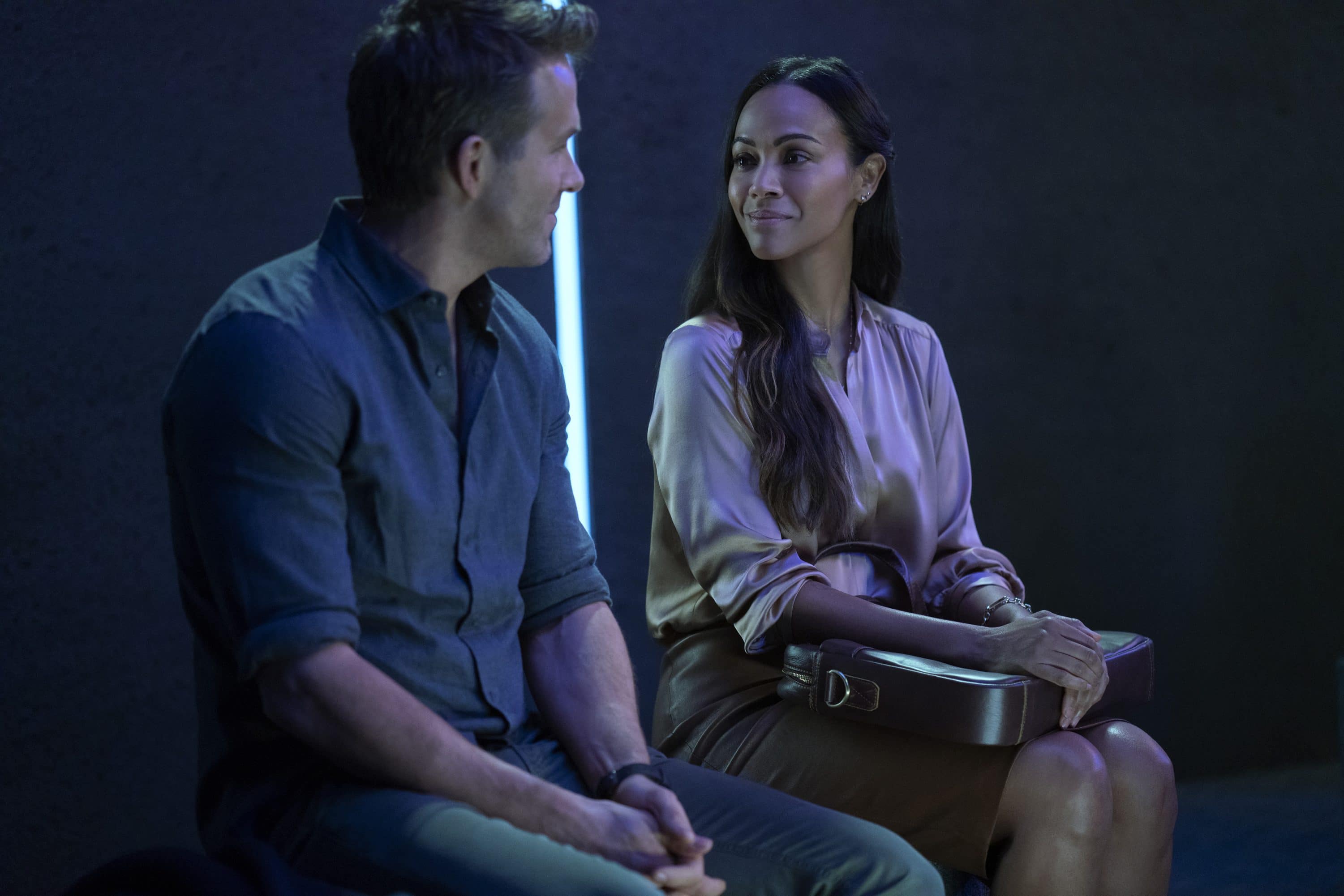 The Adam Project (L to R) Ryan Reynolds as Big Adam and Zoe Saldana as Laura. Cr. Doane Gregory/Netflix © 2022