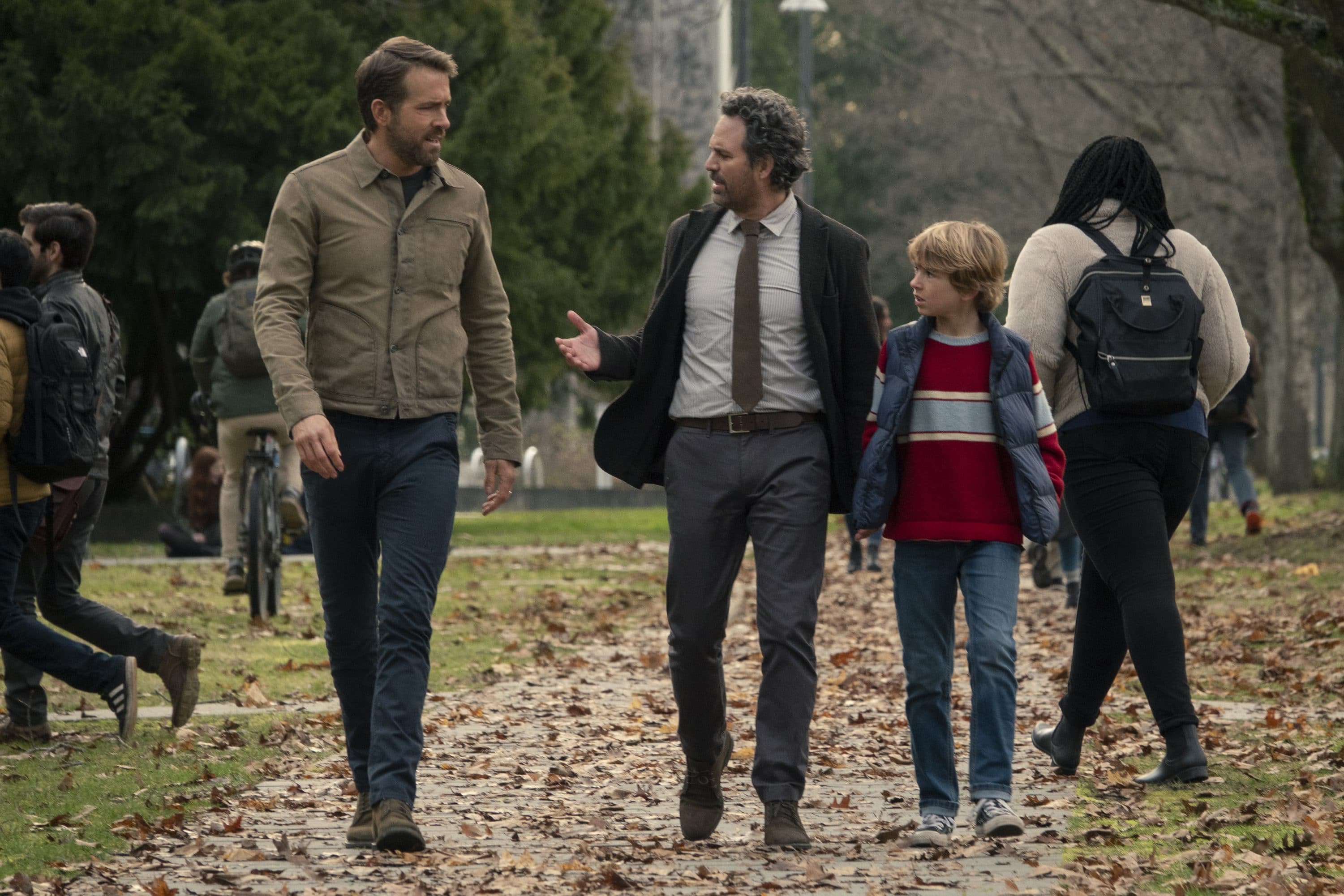 The Adam Project (L to R) Ryan Reynolds as Big Adam, Mark Ruffalo as Louis Reed and Walker Scobell as Young Adam. Cr. Doana Gregory/Netflix © 2022