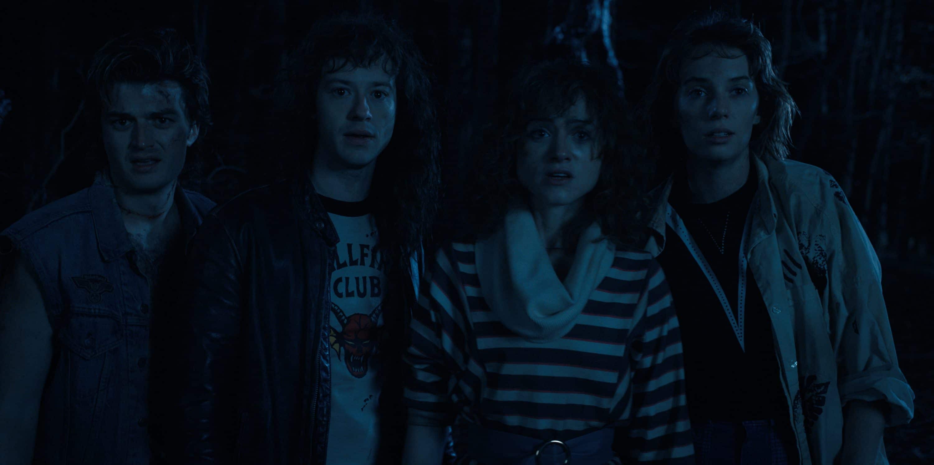 STRANGER THINGS. (L to R) Joe Keery as Steve Harrington, Joseph Quinn as Eddie Munson, Natalia Dyer as Nancy Wheeler, and Maya Hawke as Robin Buckley in STRANGER THINGS. Cr. Courtesy of Netflix  © 2022