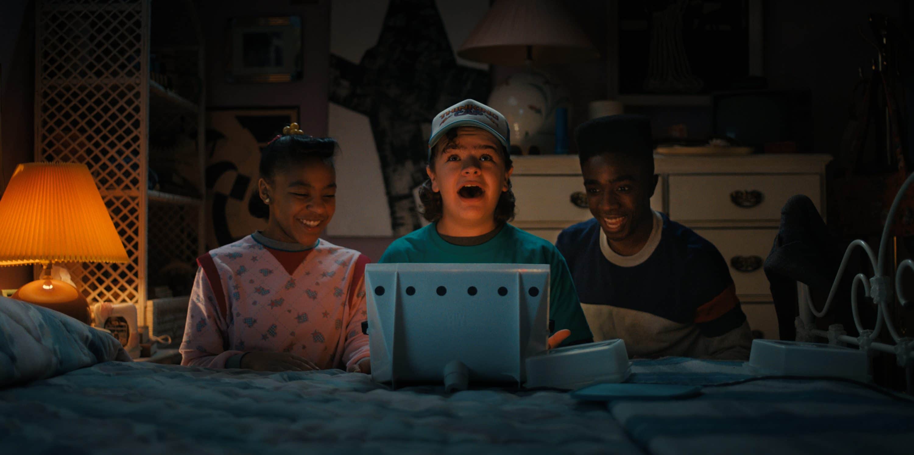 STRANGER THINGS. (L to R) Priah Ferguson as Erica Sinclair, Gaten Matarazzo as Dustin Henderson and Caleb McLaughlin as Lucas Sinclair in STRANGER THINGS. Cr. Courtesy of Netflix  © 2022