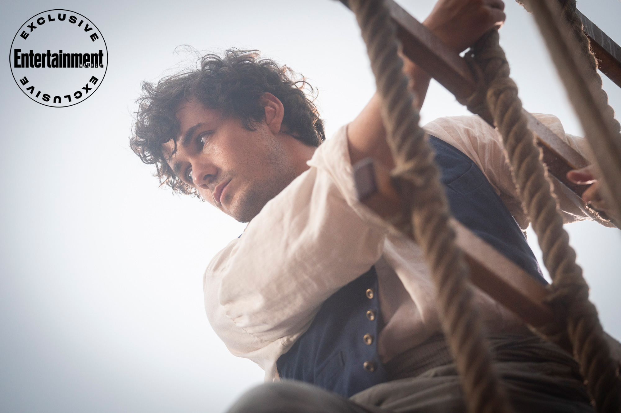 Jonah Hauer-King as Prince Eric in Disney's live-action THE LITTLE MERMAID. Photo by Giles Keyte. © 2023 Disney Enterprises, Inc. All Rights Reserved.