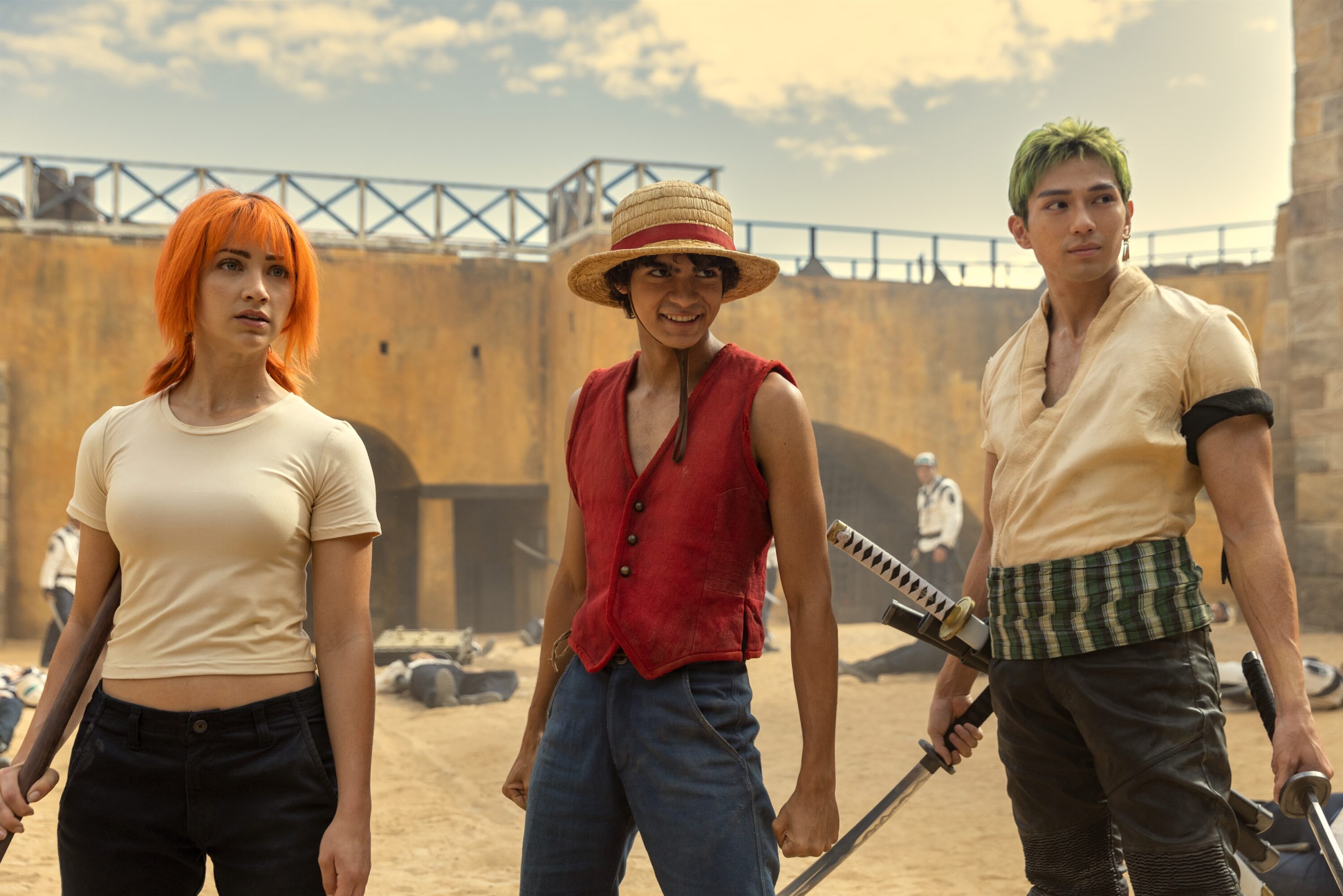 One Piece. (L to R) Emily Rudd as Nami, Iñaki Godoy as Monkey D. Luffy, Mackenyu Arata as Roronoa Zoro in season 1 of One Piece. Cr. Casey Crafford/Netflix © 2023