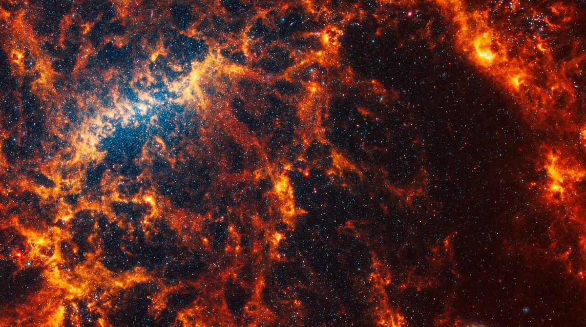 This spiral galaxy was observed as part of the Physics at High Angular resolution in Nearby GalaxieS (PHANGS) program, a large project that includes observations from several space- and ground-based telescopes of many galaxies to help researchers study all phases of the star formation cycle, from the formation of stars within dusty gas clouds to the energy released in the process that creates the intricate structures revealed by Webb’s new images. NGC 5068 is 20 million light-years away in the constellation Virgo. Learn more about what can be seen in this vast collection of Webb images here. [Image description: Webb’s image of NGC 5068 shows a portion of a messy face-on barred spiral galaxy in shades of white, yellow, orange, and red. The galaxy’s bar is a bright yellow arc-shaped region toward the centre-left, and it is very difficult to see a spiral shape.]